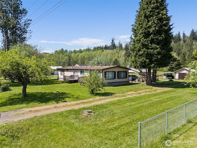 view of front of property featuring crawl space, fence, a front yard, and a deck