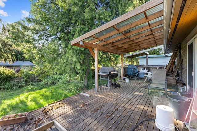 wooden deck with grilling area