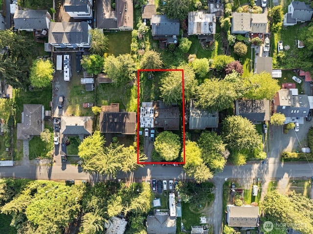 aerial perspective of suburban area featuring property boundaries highlighted