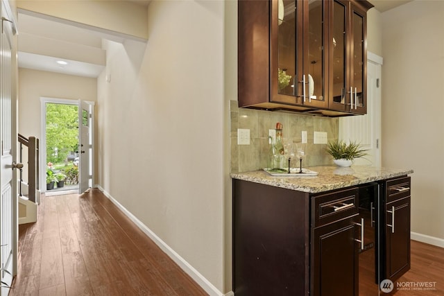 1517 Onyx St SE, Olympia, WA 98501 - bar featuring a dry bar, dark wood-type flooring, baseboards, and tasteful backsplash