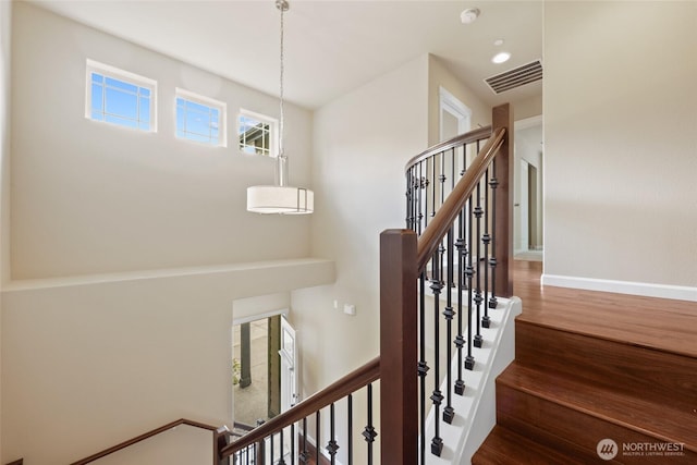 1517 Onyx St SE, Olympia, WA 98501 - stairs with baseboards, visible vents, and wood finished floors