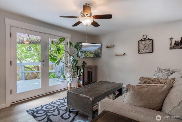 2656 168th Ave NE, Bellevue, WA 98008 - living room featuring french doors, light wood-style floors, and ceiling fan