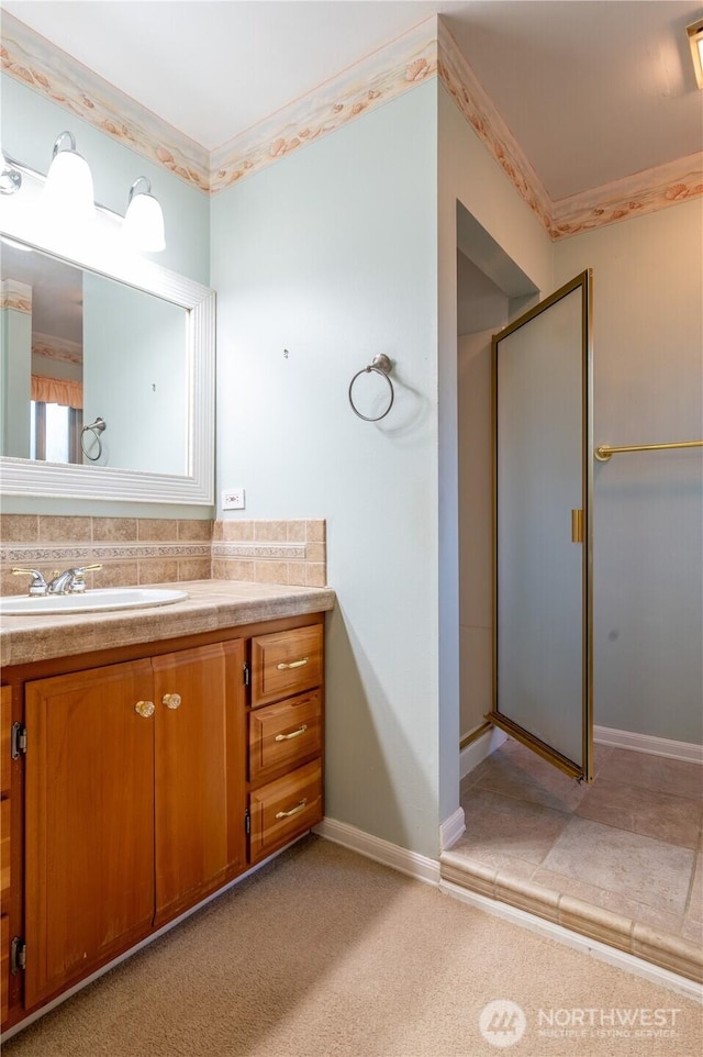 524 Carl Way, Aberdeen, WA 98520 - full bathroom with vanity, a stall shower, crown molding, carpet, and tasteful backsplash