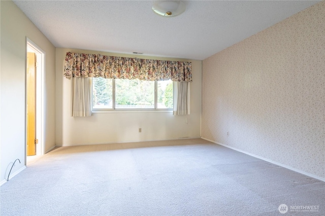 524 Carl Way, Aberdeen, WA 98520 - carpeted empty room featuring wallpapered walls and baseboards