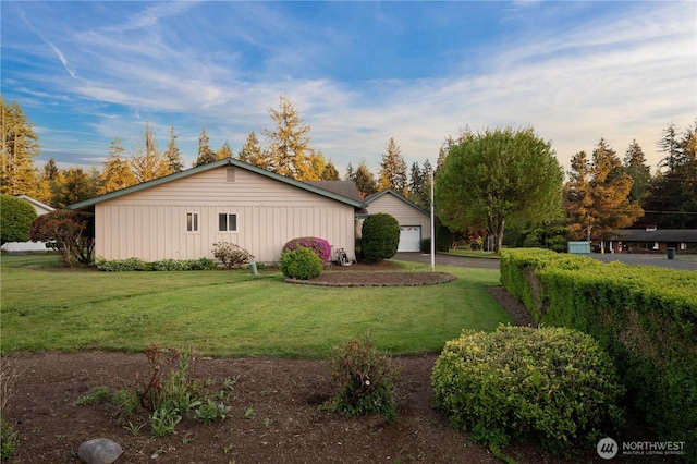 524 Carl Way, Aberdeen, WA 98520 - view of side of property featuring board and batten siding, a yard, and an outbuilding