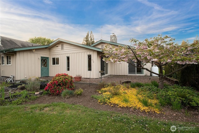 524 Carl Way, Aberdeen, WA 98520 - back of house with board and batten siding and a chimney