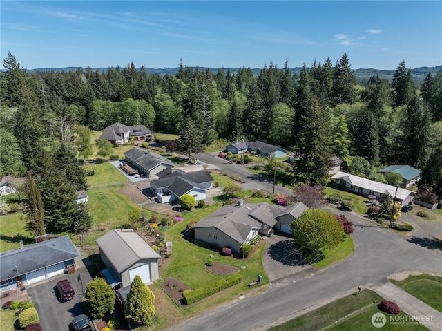 524 Carl Way, Aberdeen, WA 98520 - aerial perspective of suburban area with a heavily wooded area