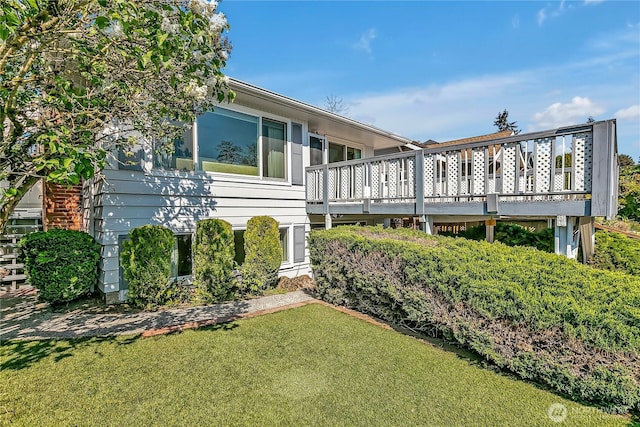 7351 32nd Ave SW, Seattle, WA 98126 - view of side of property featuring a lawn and a deck