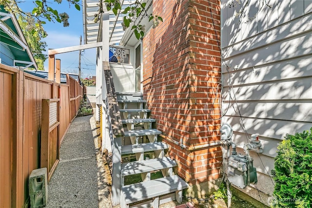 7351 32nd Ave SW, Seattle, WA 98126 - view of home's exterior featuring fence and stairs