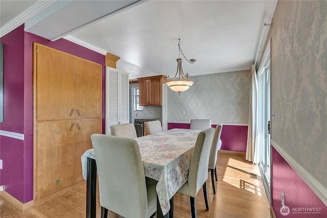 7351 32nd Ave SW, Seattle, WA 98126 - dining space featuring light wood-type flooring and baseboards
