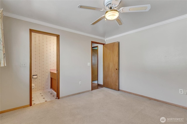 7351 32nd Ave SW, Seattle, WA 98126 - unfurnished bedroom with ornamental molding, baseboards, carpet floors, ensuite bath, and a ceiling fan