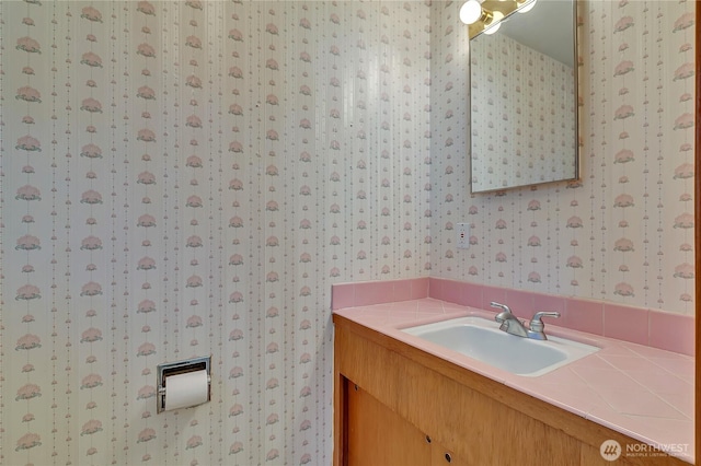 7351 32nd Ave SW, Seattle, WA 98126 - bathroom featuring wallpapered walls and vanity