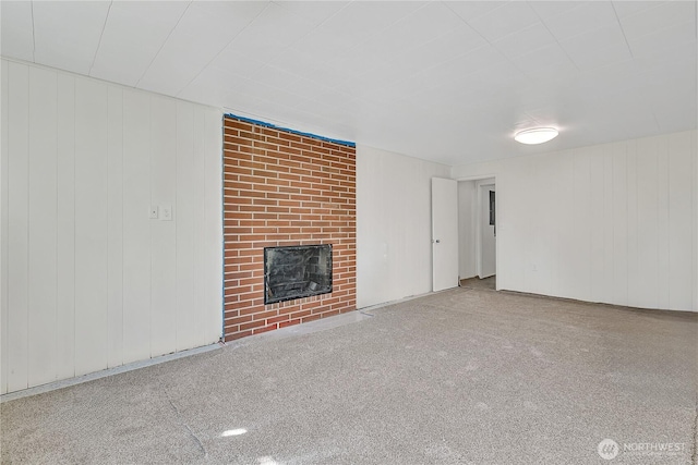 7351 32nd Ave SW, Seattle, WA 98126 - unfurnished living room featuring a fireplace and carpet
