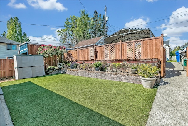 7351 32nd Ave SW, Seattle, WA 98126 - view of yard featuring a storage unit and an outdoor structure