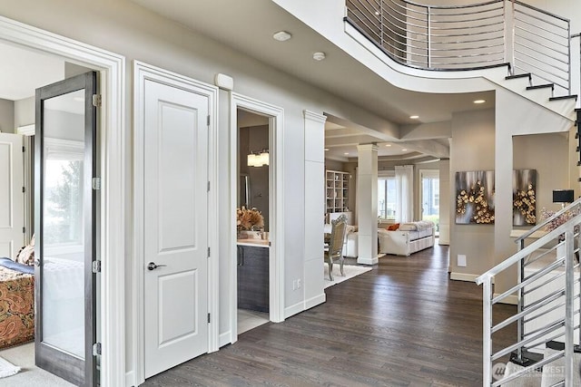 3319 Burnett Ave N, Renton, WA 98056 - entrance foyer with decorative columns, stairway, dark wood finished floors, and recessed lighting