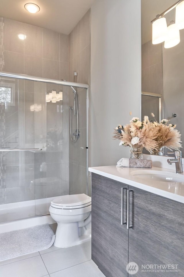 3319 Burnett Ave N, Renton, WA 98056 - full bath with vanity, a shower stall, and tile patterned floors