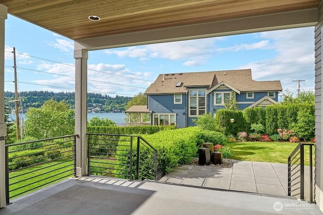 3319 Burnett Ave N, Renton, WA 98056 - patio / terrace with a water view and a lawn
