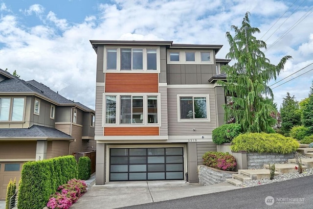 3319 Burnett Ave N, Renton, WA 98056 - contemporary house featuring an attached garage and driveway