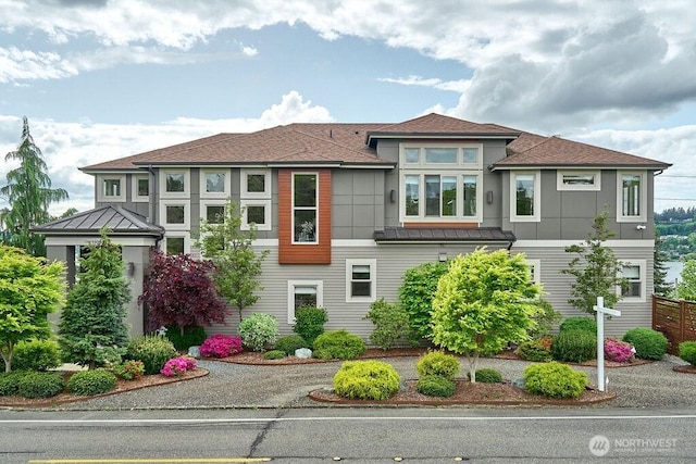 3319 Burnett Ave N, Renton, WA 98056 - prairie-style house with a standing seam roof, a metal roof, roof with shingles, and board and batten siding