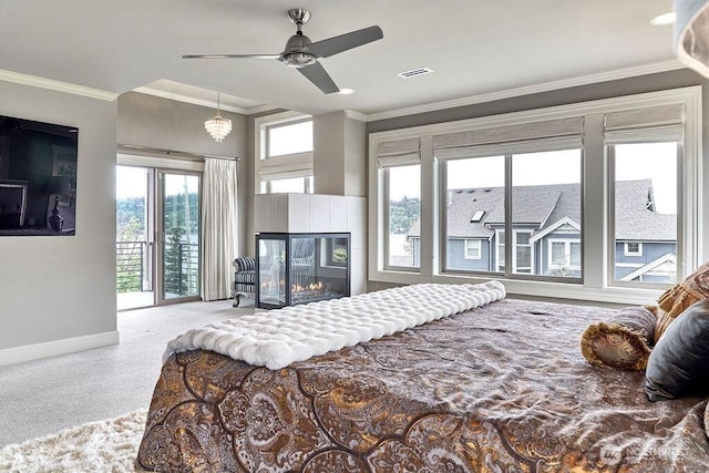 3319 Burnett Ave N, Renton, WA 98056 - bedroom with access to exterior, a glass covered fireplace, crown molding, and ceiling fan