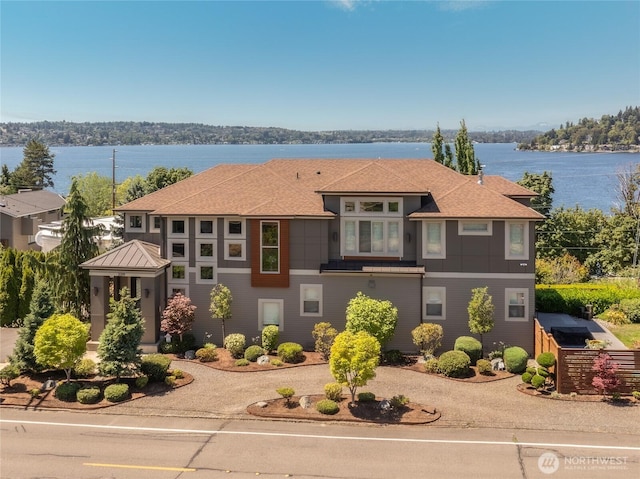 3319 Burnett Ave N, Renton, WA 98056 - prairie-style house featuring a water view and roof with shingles