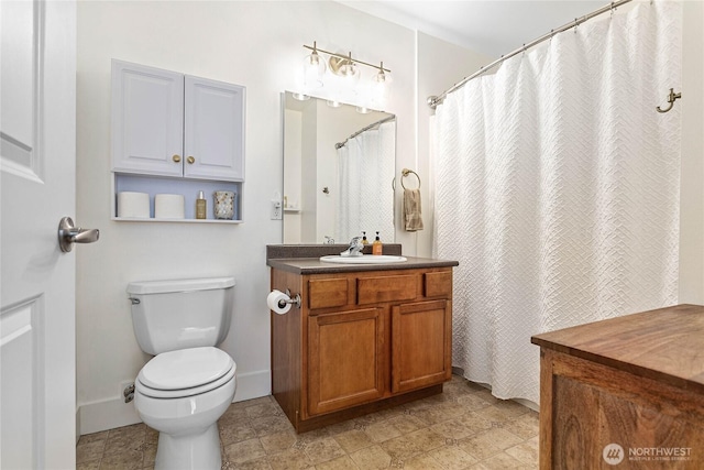 1015 Railroad Ave Unit 405, Bellingham, WA 98225 - bathroom with vanity, toilet, and baseboards