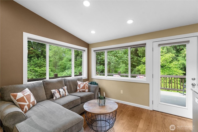 10811 164th Pl NE, Redmond, WA 98052 - living area featuring lofted ceiling, healthy amount of natural light, baseboards, wood finished floors, and recessed lighting