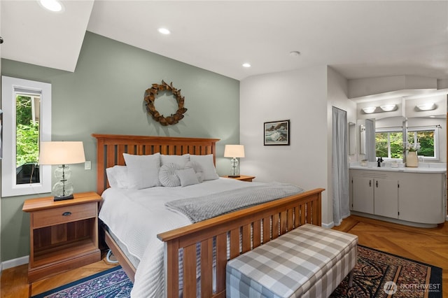 10811 164th Pl NE, Redmond, WA 98052 - bedroom featuring baseboards, recessed lighting, lofted ceiling, and a sink
