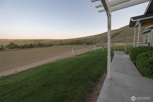 exterior space with a rural view