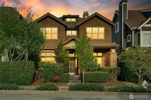 view of front of property featuring a chimney