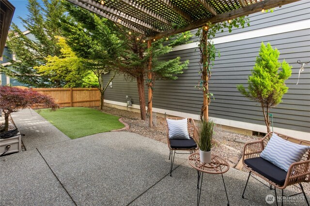 view of patio with a fenced backyard and a pergola