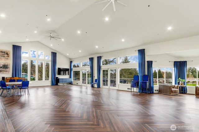 workout room featuring ceiling fan, high vaulted ceiling, and recessed lighting