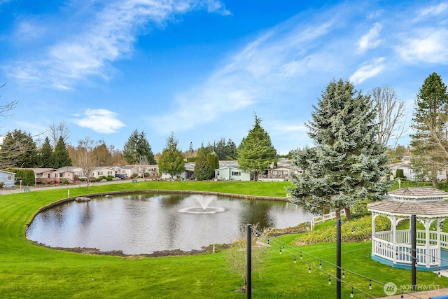 view of water feature featuring a gazebo and a residential view