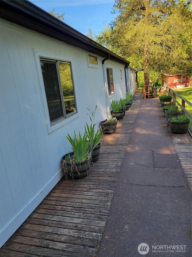 view of side of home featuring a deck