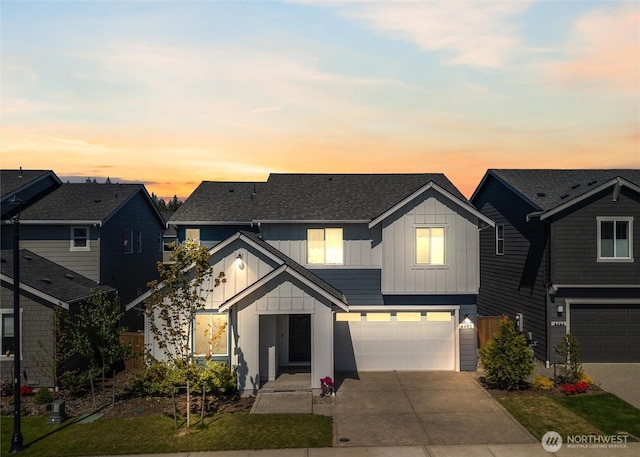 view of front of property featuring board and batten siding, a garage, concrete driveway, and a shingled roof