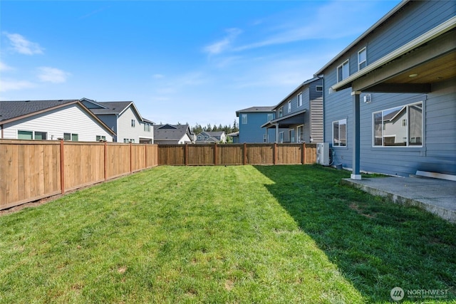 view of yard featuring a residential view