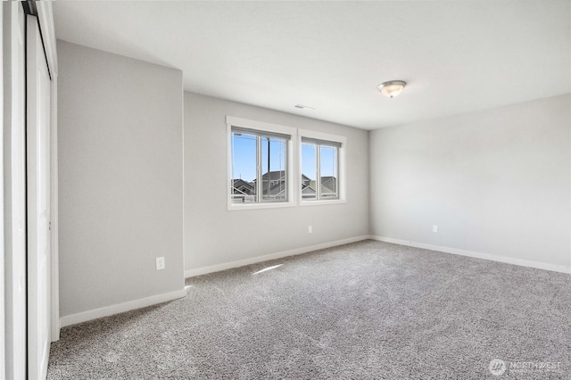 711 NE 8th Ave, Ephrata, WA 98823 - spare room with baseboards and carpet