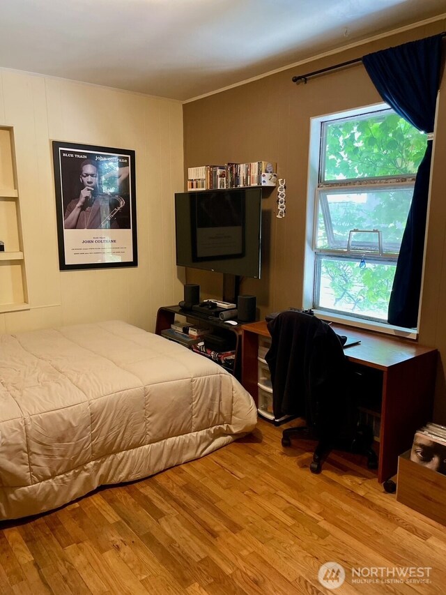 10202 1st Ave NW, Seattle, WA 98177 - bedroom with wood finished floors and crown molding