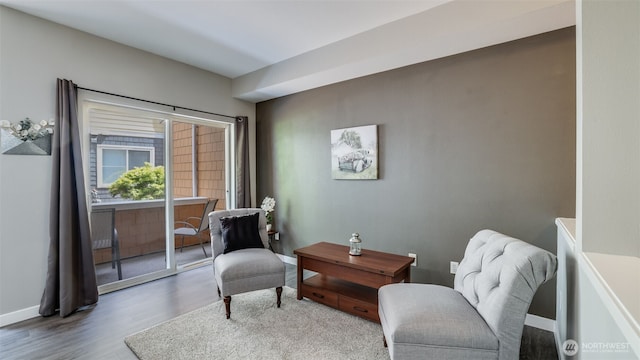 564 225th Ln NE Unit A-105, Sammamish, WA 98074 - sitting room with wood finished floors and baseboards