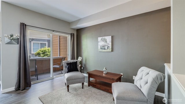 564 225th Ln NE Unit A-105, Sammamish, WA 98074 - sitting room featuring wood finished floors and baseboards