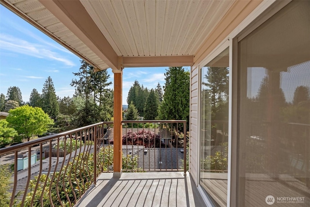 12050 15th Ave NE Unit 404, Seattle, WA 98125 - balcony featuring view of wooded area