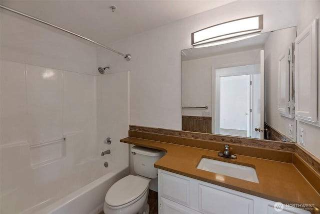 12050 15th Ave NE Unit 404, Seattle, WA 98125 - bathroom featuring toilet, shower / bathtub combination, and vanity