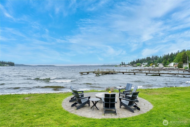 9201 NE Juanita Dr Unit 205, Kirkland, WA 98034 - view of grassy yard featuring a water view and an outdoor fire pit