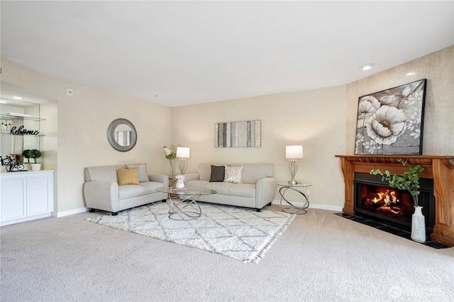 9201 NE Juanita Dr Unit 205, Kirkland, WA 98034 - carpeted living room featuring a fireplace with flush hearth and baseboards