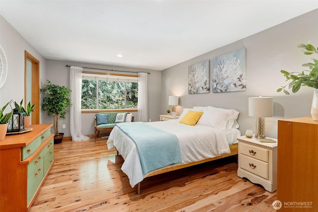26911 312th Ave SE, Ravensdale, WA 98051 - bedroom with light wood-style flooring, baseboards, and recessed lighting