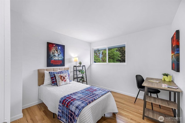 12219 SE 64th Pl, Bellevue, WA 98006 - bedroom with wood finished floors and baseboards