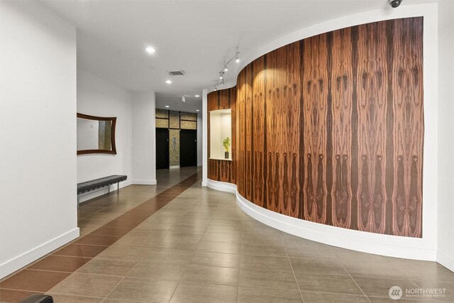 reception featuring recessed lighting