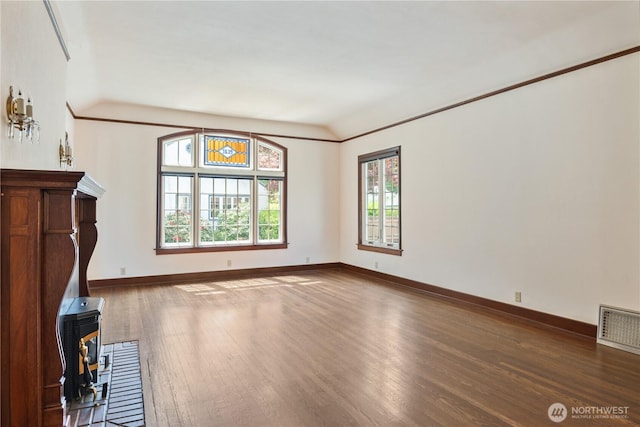 1639 21st Ave, Longview, WA 98632 - unfurnished living room featuring wood finished floors and baseboards