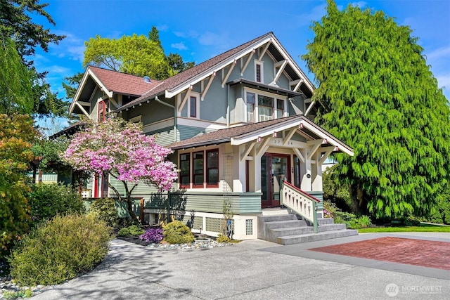 2234 Main St, Ferndale, WA 98248 - view of front facade with stucco siding, a shingled roof, and a porch