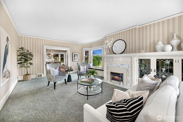 2234 Main St, Ferndale, WA 98248 - living room featuring wallpapered walls, carpet floors, crown molding, and a premium fireplace